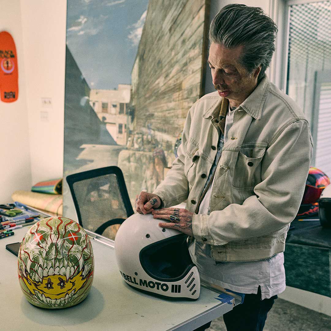 Grime designing a helmet